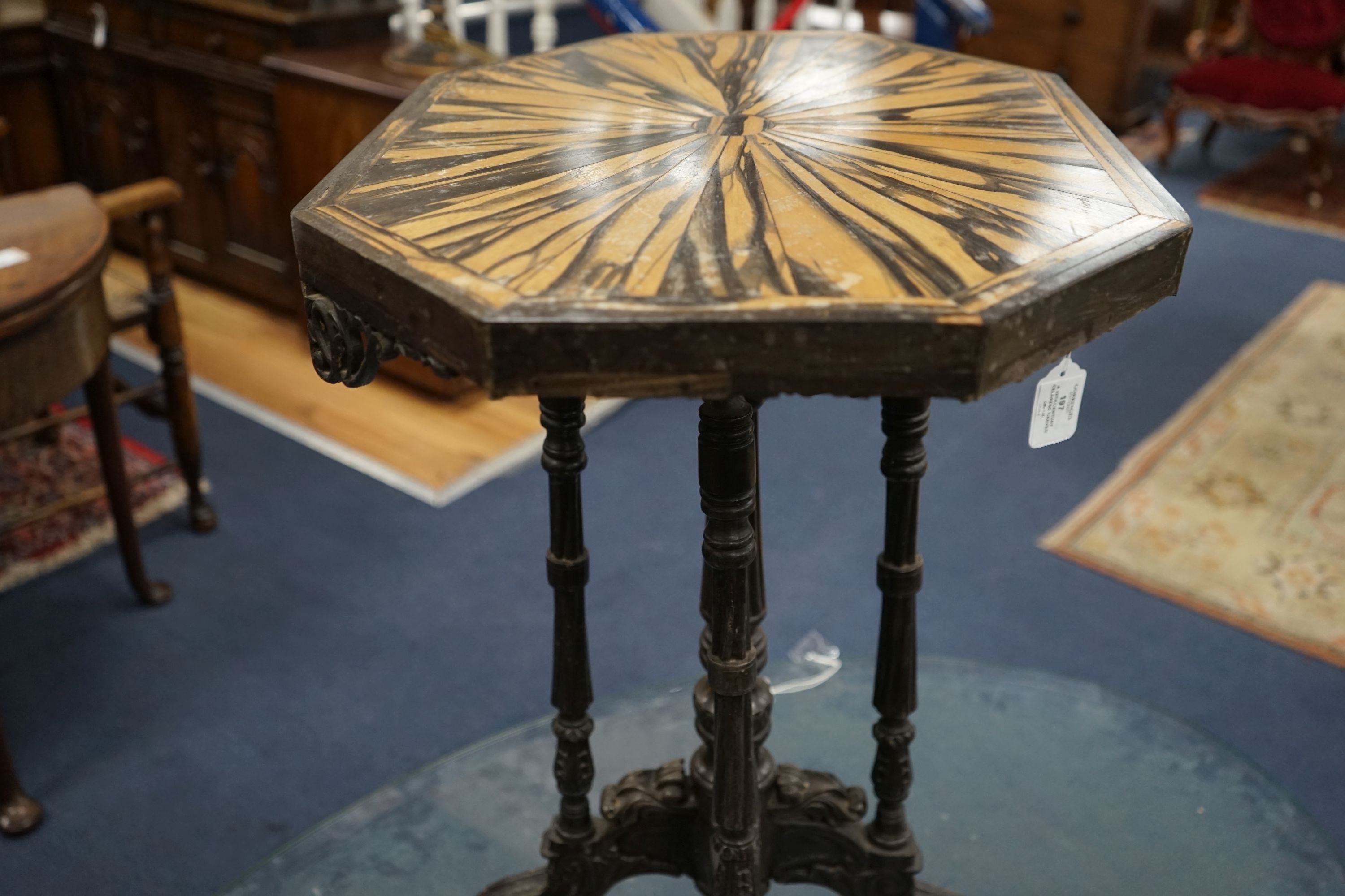 A 19th century Celanese carved ebony and coromandel veneered octagonal occasional table, width 57cm, depth 42cm, height 70cm